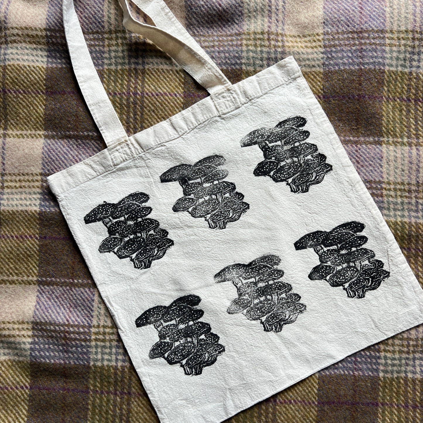canvas tote with black stamped mushroom design