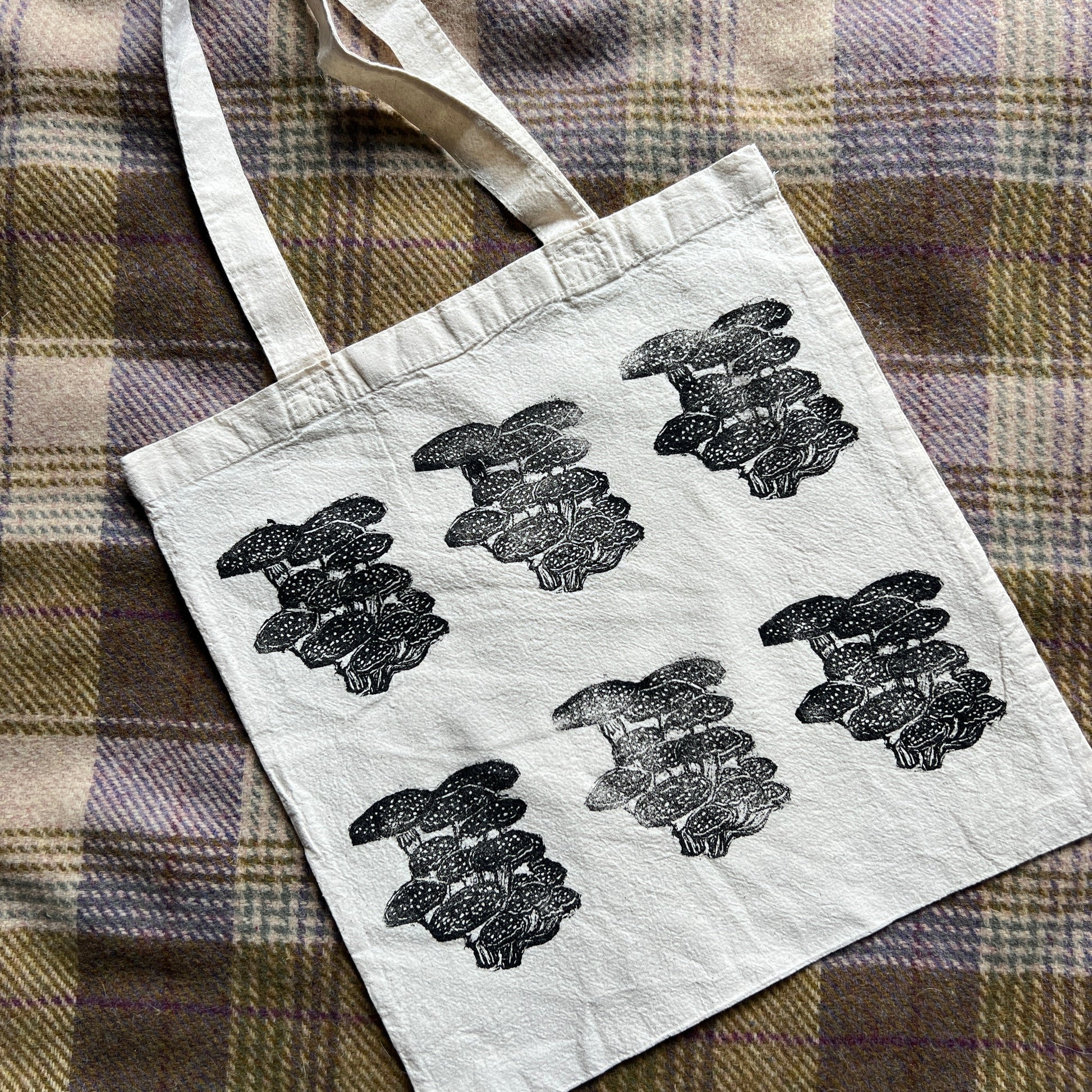 canvas tote with black stamped mushroom design