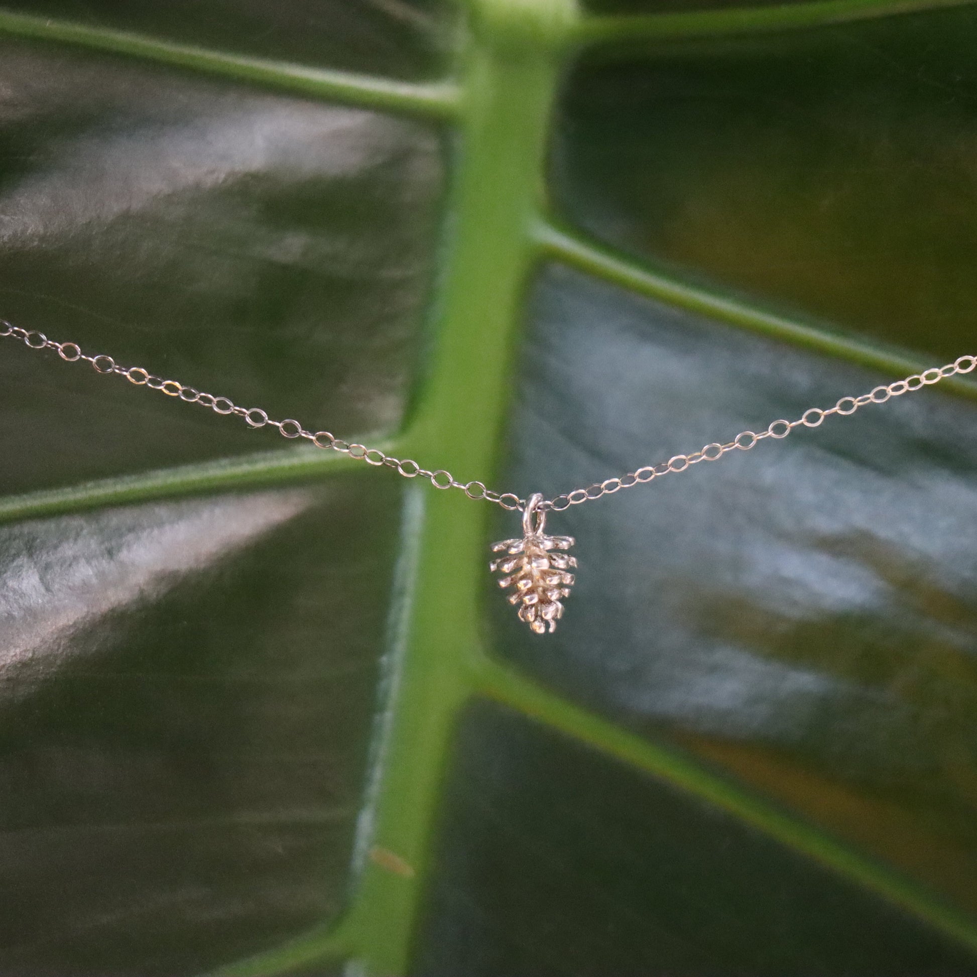 one silver pinecone charm necklace